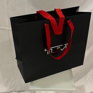 TUMI Men's Bag with Black and Red Design